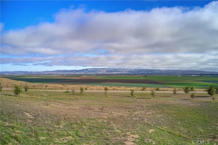 Unobstructed Panoramic View of the green belt, valley, foothills and sand dunes...

