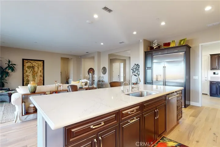 Gourmet Kitchen featuring an 11-foot Quartz Center Island with a bull nose finish