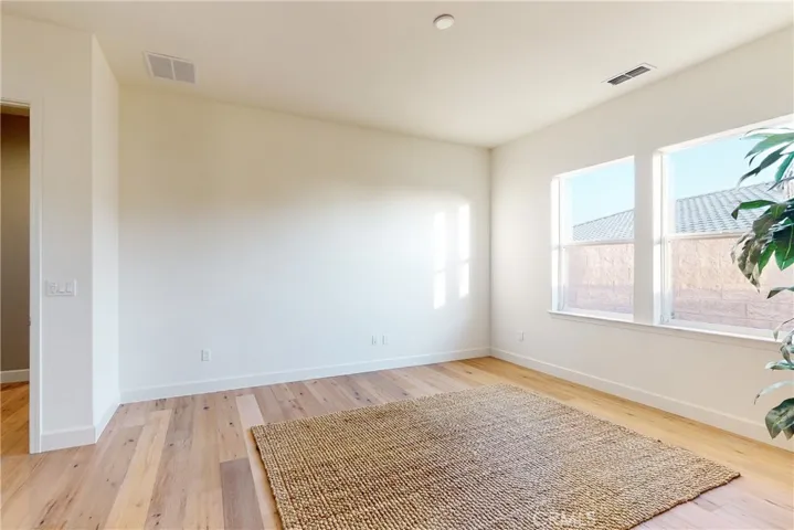Fantastic Master Bathroom has a walk-in shower with a seamless glass enclosure, separate tub, dual sinks and a walk-in closet with lots of storage space
