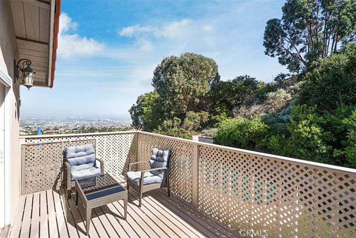 Deck off the upper family room.  Don't be jumping into the pool from here.