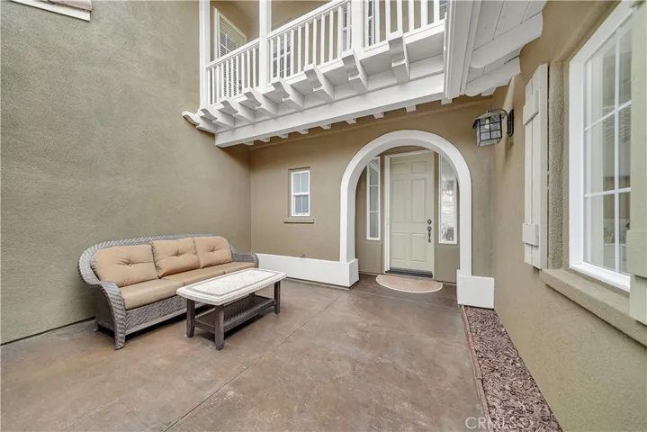 Enter through Iron Gate into Private Courtyard