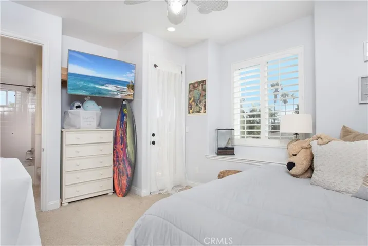 Main house- Secondary bedroom with private balcony!