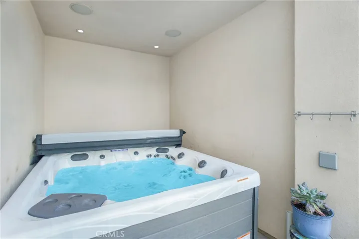 Cozy niche with surround sound speakers.