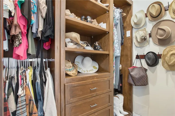 One of 2 walk in closets in master with built ins!