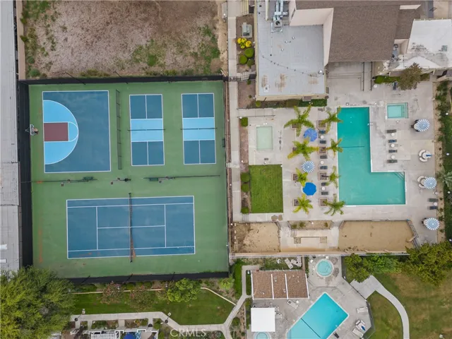 pickleball tennis and basketball next to clubhouse