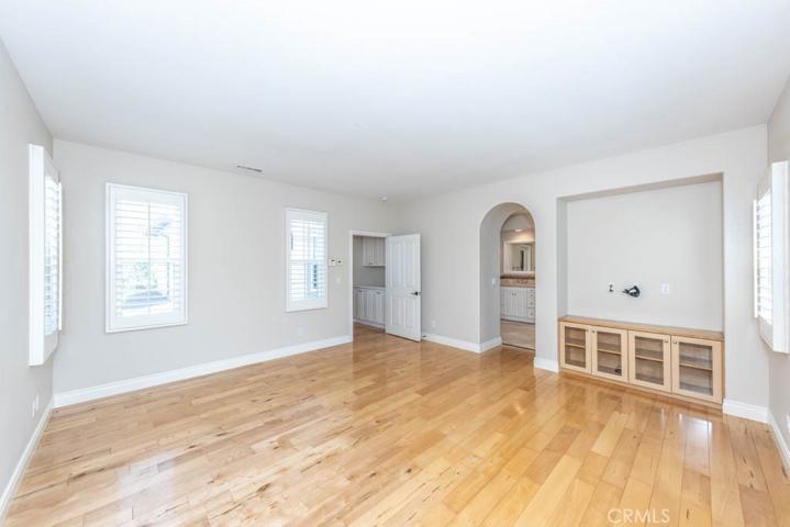 Primary bedroom looking in primary bathroom