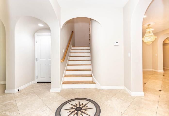 Foyer area left is den/office. Right is dining room