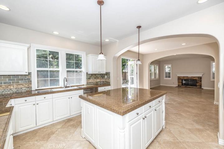 Kitchen with stainless steel appliances and granite counters