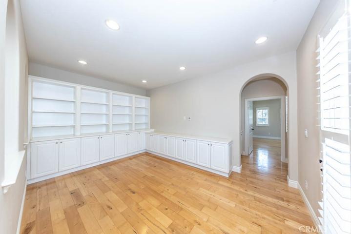 Loft with built-in cabinets