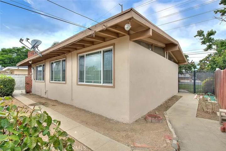 House has been freshly painted. plenty of walkway lead you around the property.