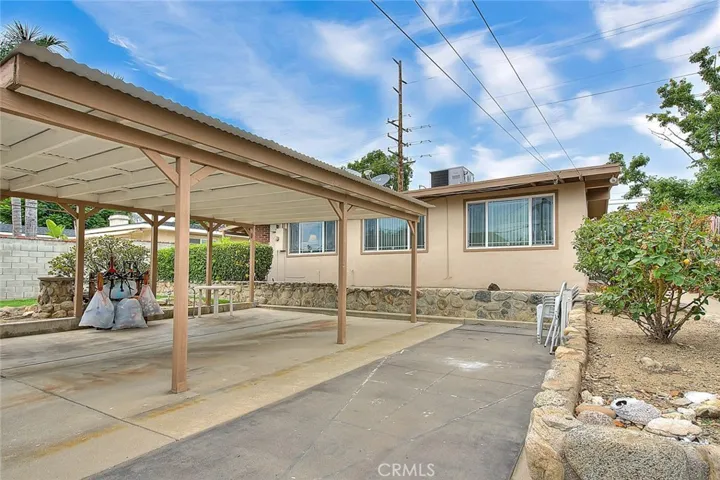 possible RV parking alongside the covered patio