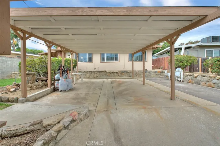 Covered patio can double as a 5 parking spot.