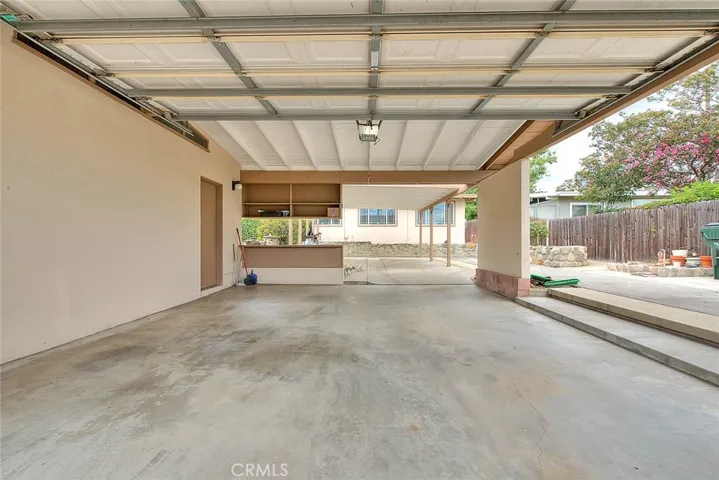Garage door and automated opener with direct access to garage.