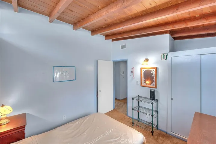 Bedroom number 2 also feature lovely wood ceilings.