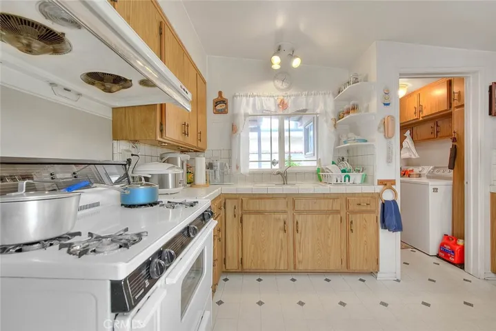 Spacious kitchen with gas range.