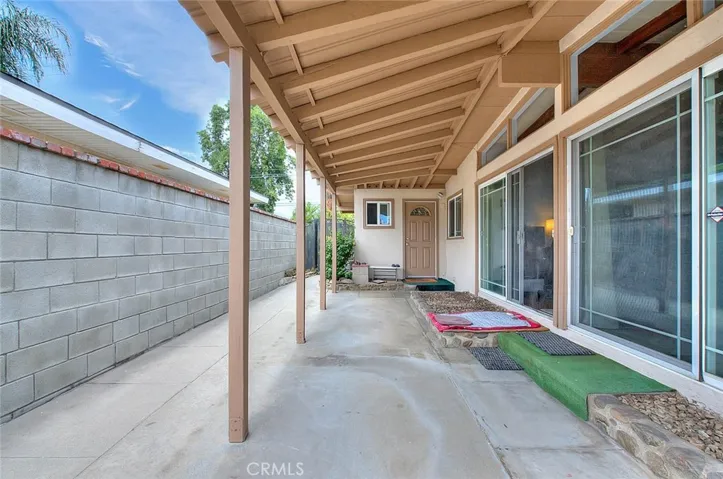 Extend your living area on to this cover patio.  Great place for your BBQ, smoker or flat iron grill.