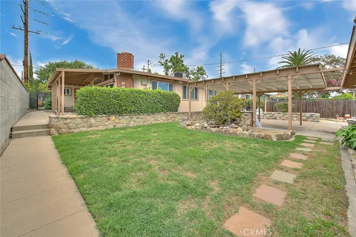 spacious backyard with grass area