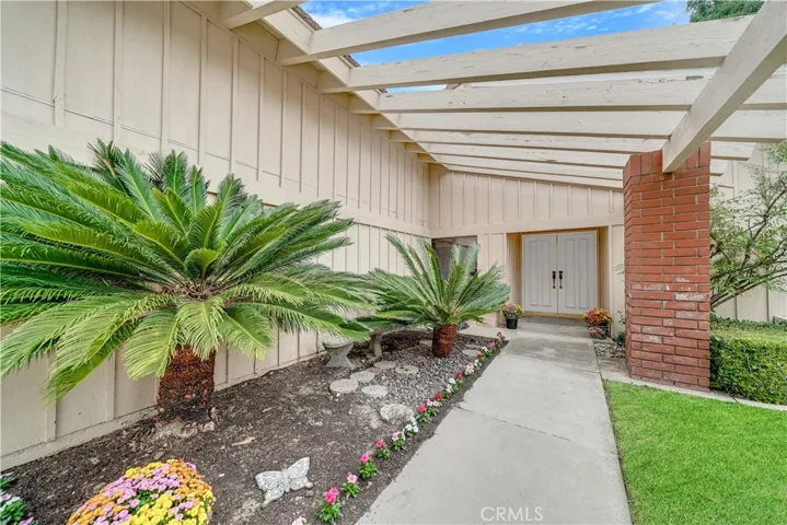 Inviting entry, perfect for a gated courtyard.