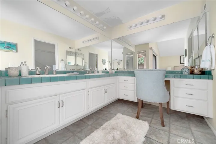 Master bath is original, two vanities, and lots of counterspace.