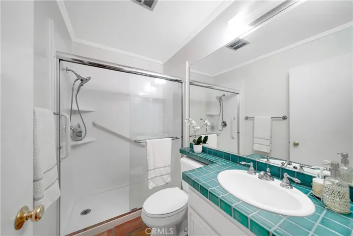 Guest bathroom. Shower has been redone.