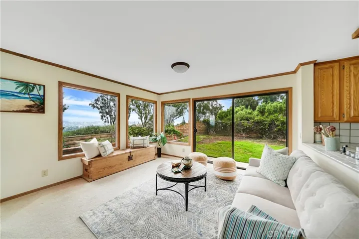 Two sliding doors in family room allows guests to freely maneuver throughout.