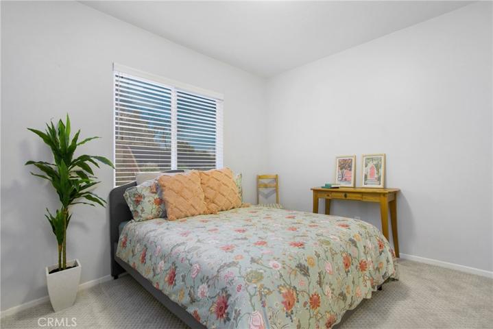 Bedroom overlooking backyard