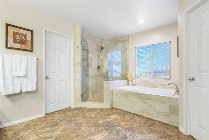 Stunning Master bath with angled shower and separate tub
