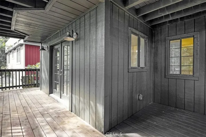 Studio double door entry and deck