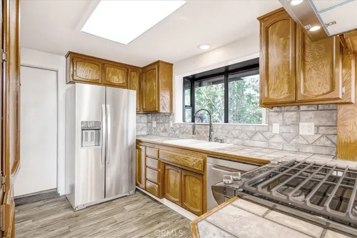 Kitchen with garden window and direct entry from garage