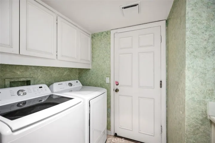 Inside laundry room.