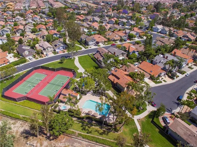 See the one story home across the street from the tennis courts and just to the left of the walkway? 5 Vispera is in a great location directly behind that one story.