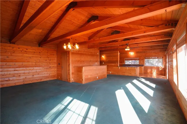 Living room, 1/2 bath, dining area & Kitchen.