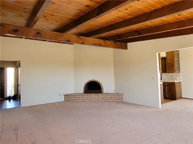 Light and bright, the Living Room benefits from the wall of ocean viewing windows!