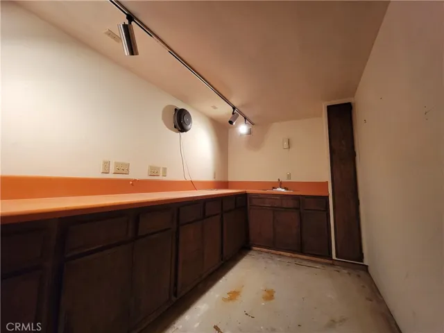 And that unpermitted room leads to another unpermitted room!  Of note, the sewer lateral going out to the street is on the other side of that far wall.  These two rooms make up another 189 SF, approximately.