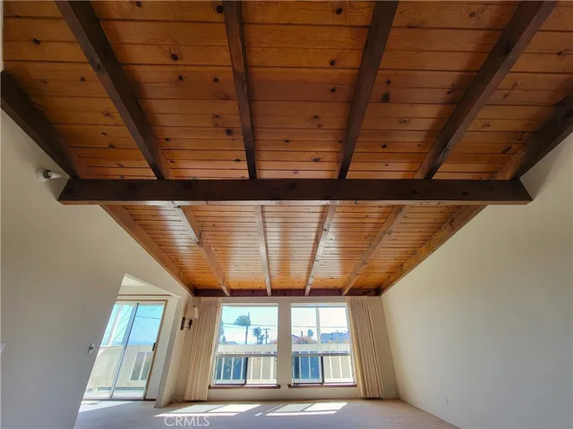 Yes!  An original vaulted tongue and groove ceiling that has NOT been painted over through the years!  So nice to see!!