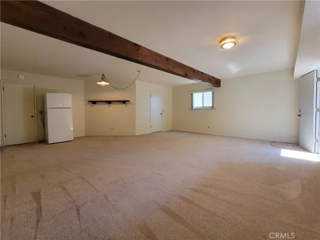 Downstairs is 517 SF of heated, habitable, permitted Space w/storage (center door) and its own entrance.  Extended family?  Accessory Dwelling Unit for income? What would you do???