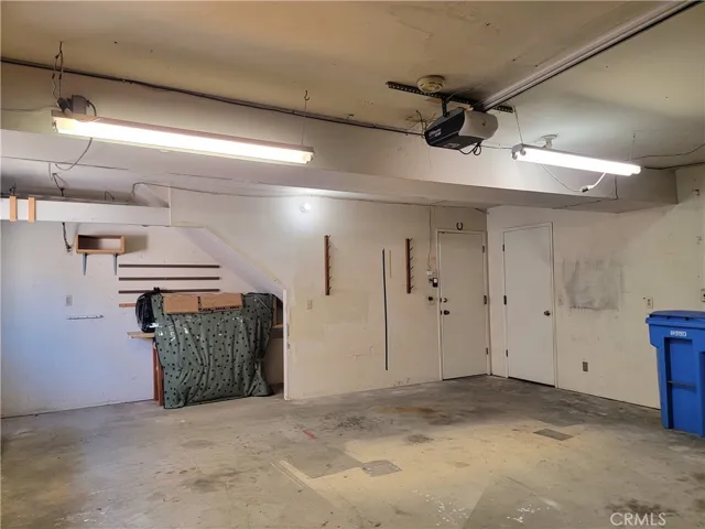 More Storage Space continues under the staircase!  Notice the door to the right...?