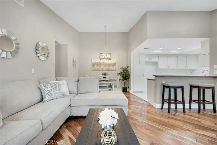 Living Room Opens to Kitchen and Dining Area