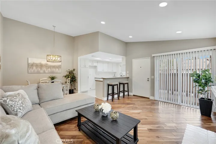 Living Room Opens to Kitchen and Dining Area