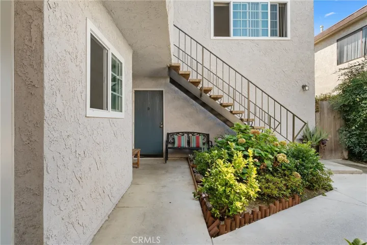 Entrance to first floor 2 bedroom apartment with large backyard