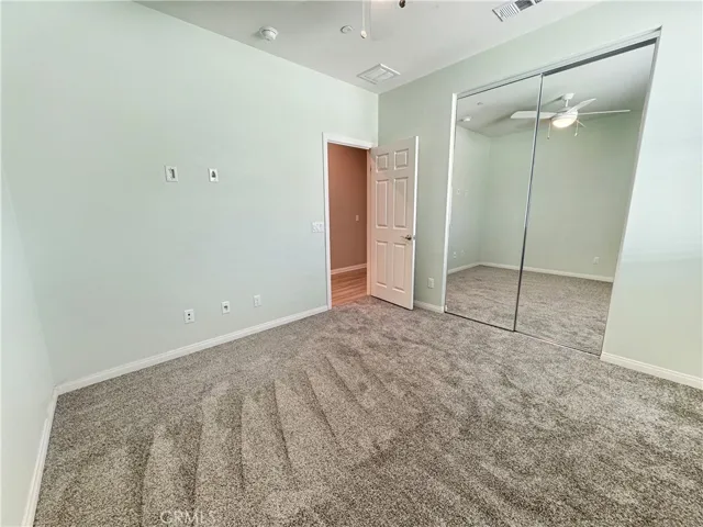 Bedroom 2 with Mirrored Closet Doors