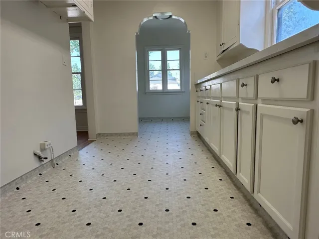 New Flooring throughout kitchen, Break Nook and Oversized Laundry/.Workshop area.