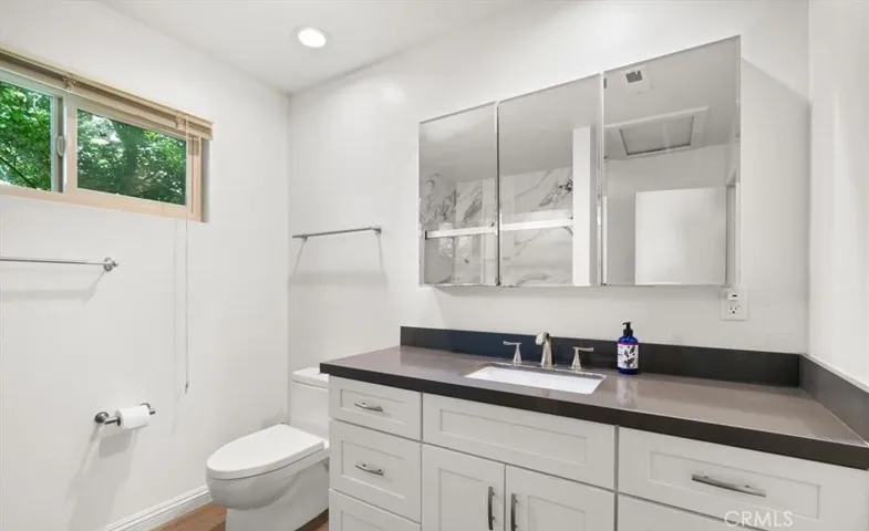 Renovated Common Bathroom with shower in tub