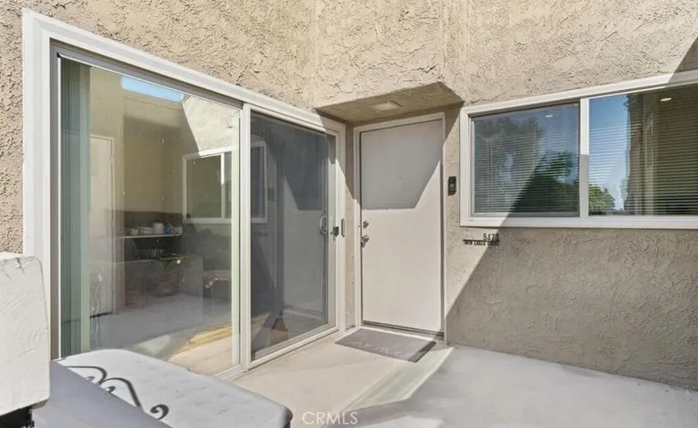 Top of stairs - your own entrance and private gated patio area