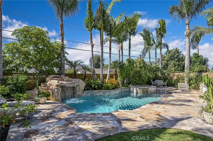 Drop dead gorgeous yard that is a true "Entertainer's Paradise" with all the amenities