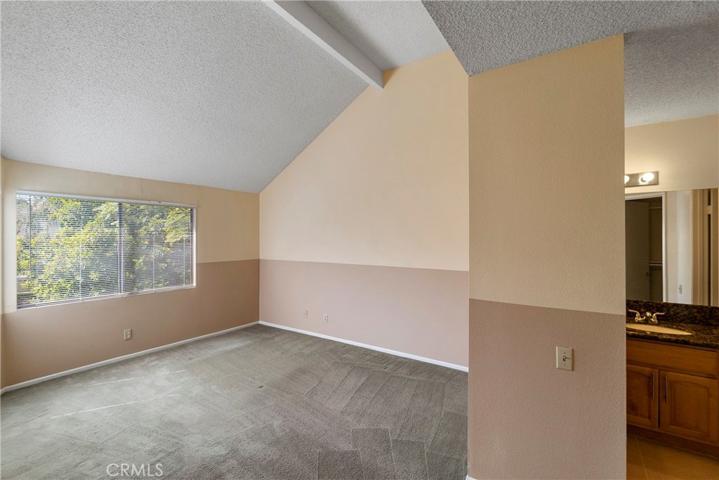 Master bedroom adjacent to bathroom