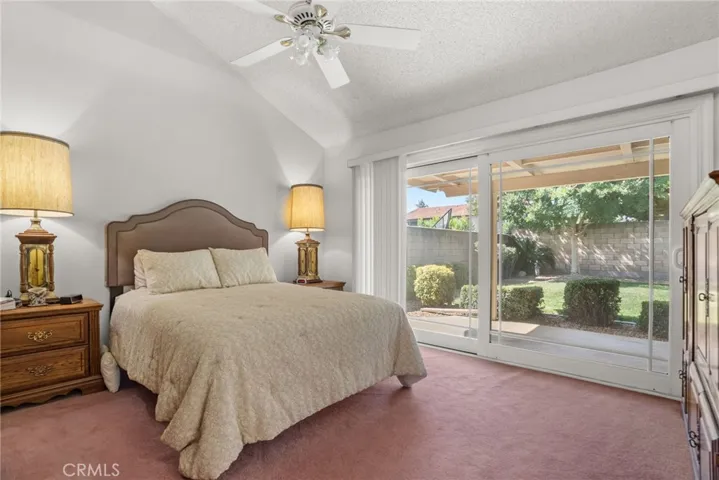 Master bedroom with access to backyard through huge sliding milgard doors