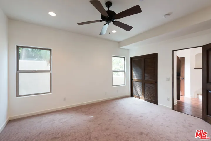 Hardwood floors replace carpeting.
