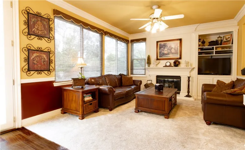 Family Room, the detailed molding has additional beautiful enhancements here. All rooms with the exception of downstairs office and 1 of the upstairs bathroom has the 6.5 inch crown molding.