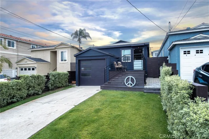 Wonderful curb appeal with gated entry and grassy yard